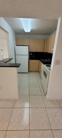Villa Bellini, 7110 NW 179th St #308, Country Club, Florida 33015, image 1