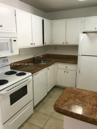 Villa Bellini, 7180 NW 179th St #211, Country Club, Florida 33015, image 1