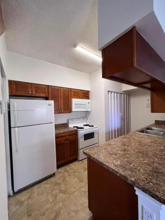 La Hacienda Country Club Of Miami, 18332 NW 68th Ave #A, Country Club, Florida 33015, image 1