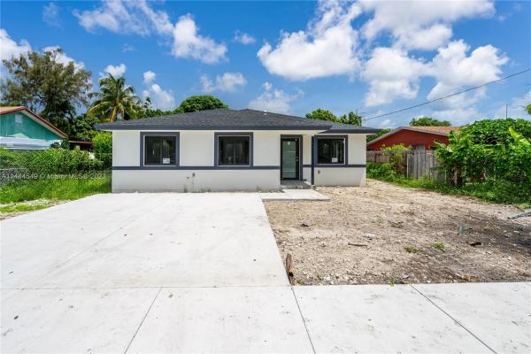Gratigny Place, 731 NW 117, Pinewood, Florida 33168, image 1
