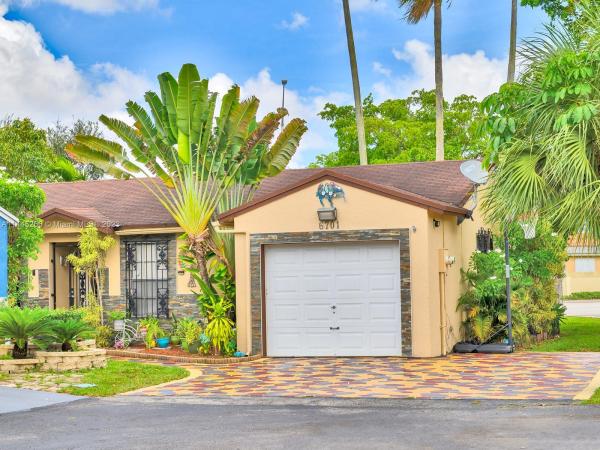 Country Lake Homes, 6701 NW 199th Ter, Country Club, Florida 33015, image 1