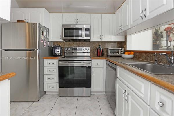 Miramar Club, 3199 Foxcroft Rd #103, Miramar, Florida 33025, image 1