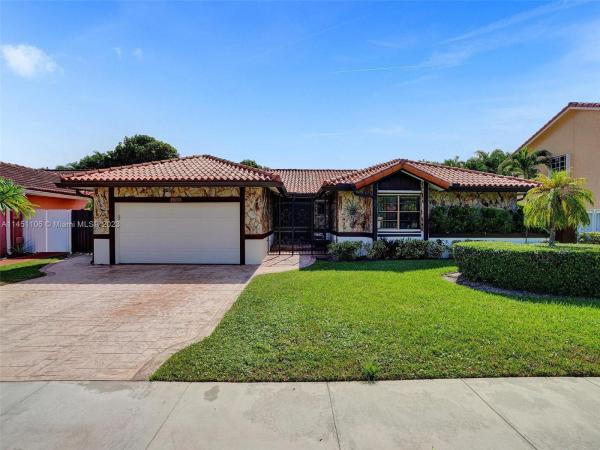 Country Lake Manors, 20117 NW 58th Pl, Country Club, Florida 33015, image 1