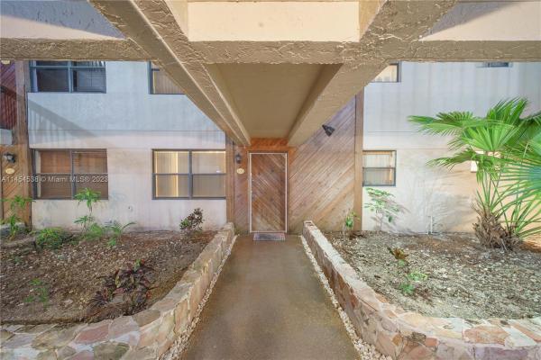 Summertree Village, 601 Ives Dairy Rd #103-8, Ives Estates, Florida 33179, image 1