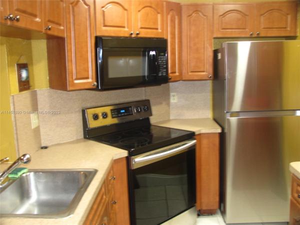 Monterey, 900 NE 209th Ter #104-31, Ives Estates, Florida 33179, image 1