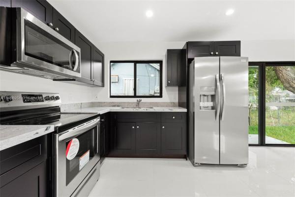 Tennyson Heights, 1716 NW 76th Ter #1716, Gladeview, Florida 33147, image 2