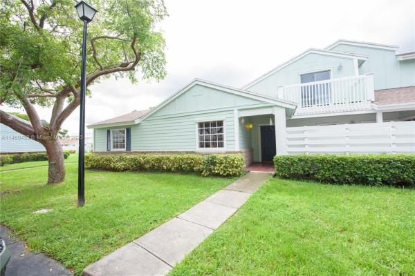 Village Homes At Country Walk, 13814 SW 149th Circle Ln #4-62, Country Walk, Florida 33186, image 1