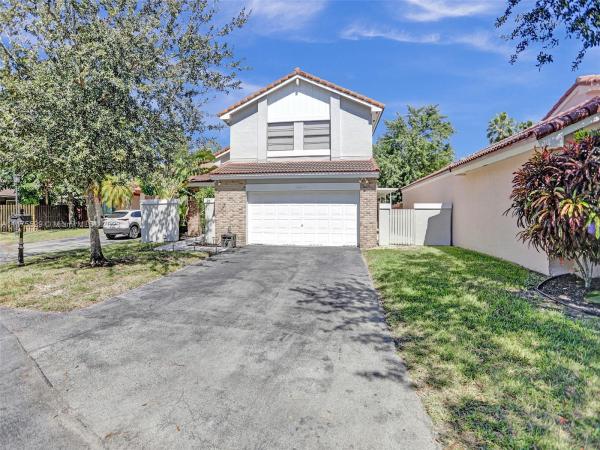 The Moors Cluster Homes, 6315 NW 173rd St, Country Club, Florida 33015, image 1