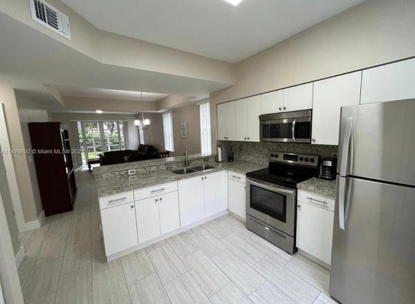 Regatta Pointe, 14827 Balgowan Rd #104-8, Miami Lakes, Florida 33016, image 3