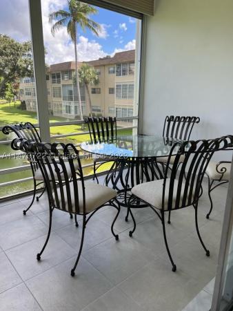 Elm Gardens, 5051 W Oakland Park Blvd #204, Lauderdale Lakes, Florida 33313, image 1