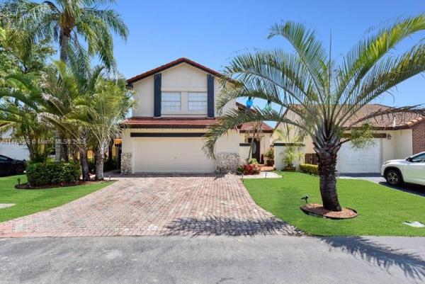 The Moors Cluster Homes, 6365 NW 173rd St, Country Club, Florida 33015, image 1