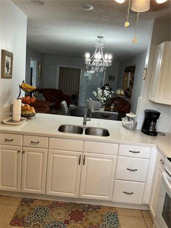 Cambridge House Of Carriage Hills, 300 Berkley Rd #110, Hollywood, Florida 33024, image 1