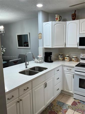 Cambridge House Of Carriage Hills, 300 Berkley Rd #110, Hollywood, Florida 33024, image 2
