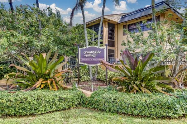 Countryside Village, 18785 NW 62nd Ave #207, Country Club, Florida 33015, image 1