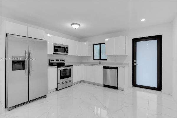 Tennyson Heights, 1712 NW 76th Ter #1712, Gladeview, Florida 33147, image 2