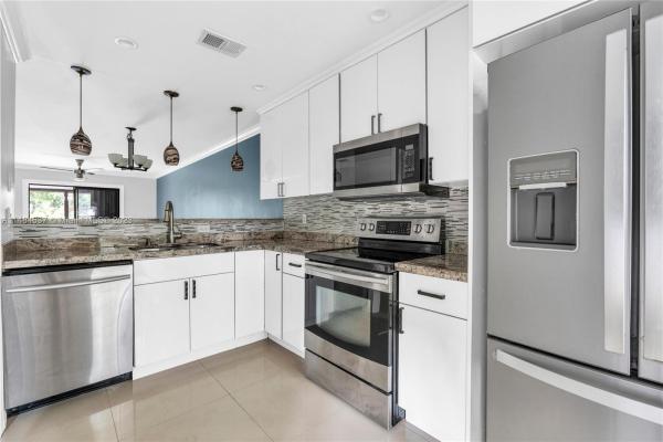 Heftler Townhouses At Red Bridge, 7911 NW 41st Ct #7911, Sunrise, Florida 33351, image 1