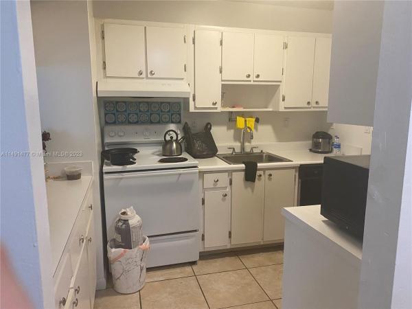 Carmel Lakes, 20731 NE 4th Pl #101, Ives Estates, Florida 33179, image 1