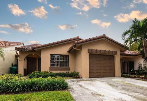 The Moors Townhouses, 17371 NW 66th Pl #17371, Country Club, Florida 33015, image 1
