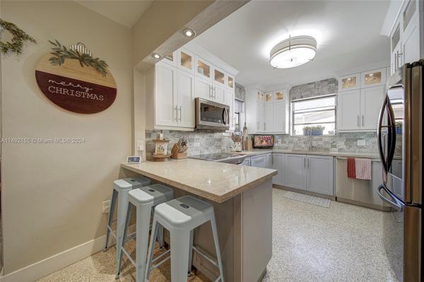 East Bass Lake Estates, 1040 N Royal Poinciana Blvd, Miami Springs, Florida 33166, image 1