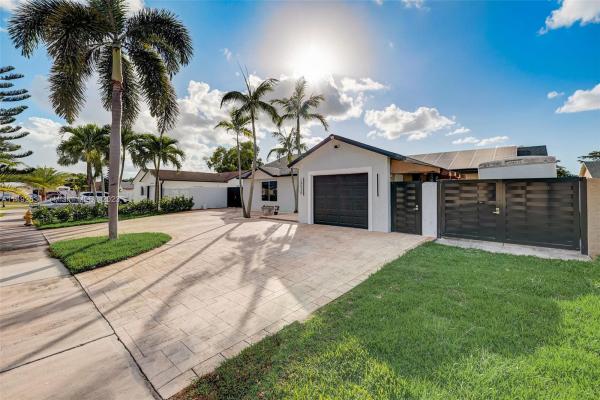 Country Lake Manors, 19530 NW 57th Ct, Country Club, Florida 33015, image 1