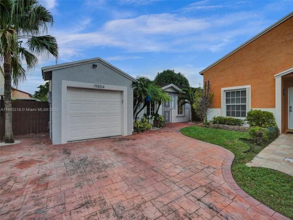 Country Lake Homes, 19854 NW 64th Pl, Country Club, Florida 33015, image 1