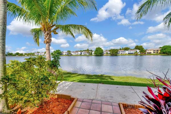 Woods Landing, 6825 NW 169th St #53G, Country Club, Florida 33015, image 1