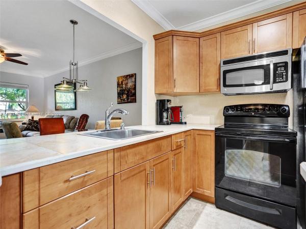Lilac Gardens, 5131 W Oakland Park Blvd #105, Lauderdale Lakes, Florida 33313, image 1