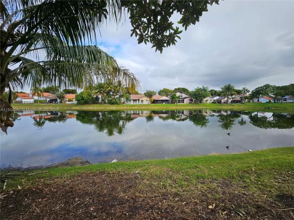 The Moors Cluster Homes, 17730 NW 63rd Ct, Country Club, Florida 33015, image 1