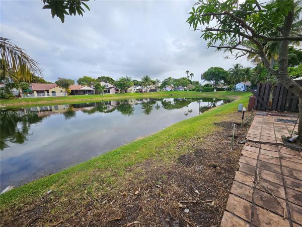 The Moors Cluster Homes, 17730 NW 63rd Ct, Country Club, Florida 33015, image 3