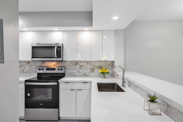Villa Rustica, 18840 NW 57th Ave #201, Country Club, Florida 33015, image 3