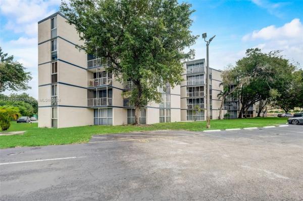 Las Brisas Country Club Of Miami, 7165 NW 186th St #A402, Country Club, Florida 33015, image 1