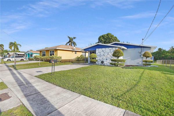 Rainbow Gardens, 15331 NW Railroad Dr, Miami Gardens, Florida 33054, image 2