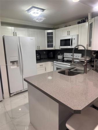 Indian Summer Village, 311 W Park Dr #13-204, Fountainebleau, Florida 33172, image 1