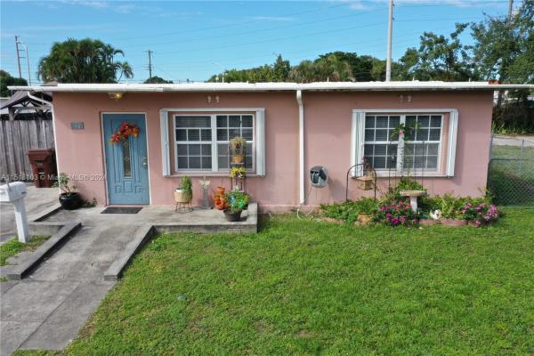 Sun Tan Village, 821 E 16th Pl, Hialeah, Florida 33010, image 1