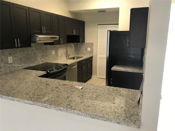 Rainbow Lakes Villas, 1740 NW 92nd Ave #1740, Pembroke Pines, Florida 33024, image 1