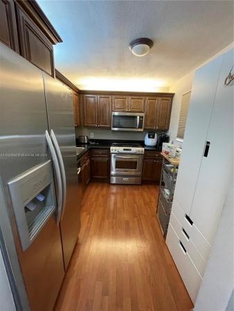 Country Lane, 17000 NW 67th Ave #405, Country Club, Florida 33015, image 3