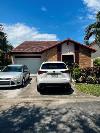 The Moors Cluster Homes, 6333 NW 174th Ter, Country Club, Florida 33015, image 1