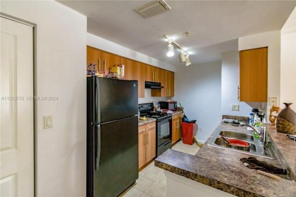 Poinciana Place, 5860 W Sample Rd #104, Coral Springs, Florida 33067, image 1