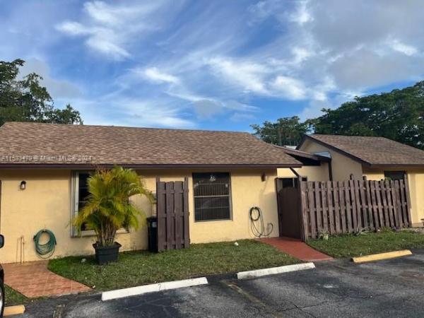 Villas At Carriage Hills Lakeside, 115 Gate Rd #2-63, Hollywood, Florida 33024, image 1