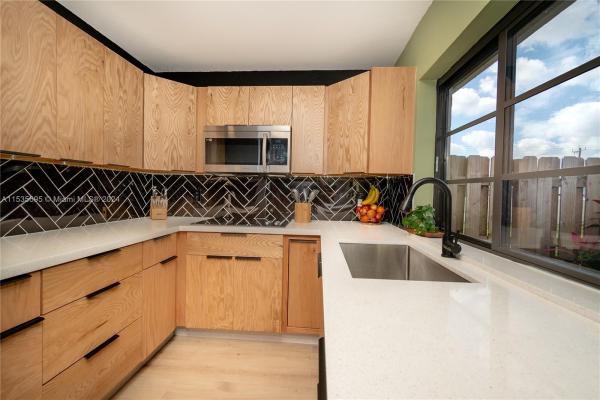 Villa Homes At The Moors, 6276 NW 170th Ter #6276, Country Club, Florida 33015, image 1