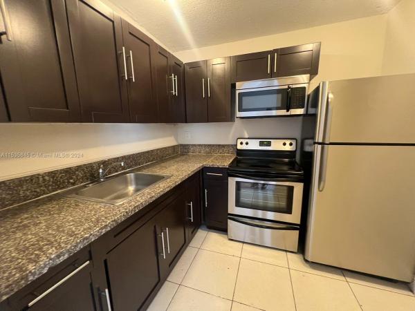 Montecarlo, 482 NW 165th St Rd #A201, Golden Glades, Florida 33169, image 1