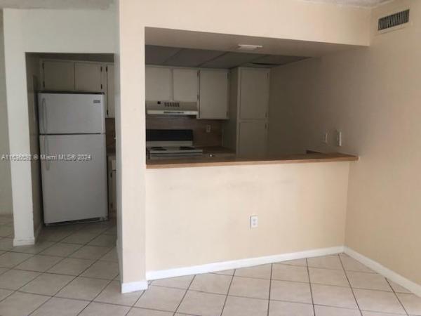 Las Brisas Country Club Of Miami, 6995 NW 186th St #E304, Country Club, Florida 33015, image 1