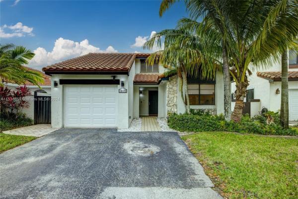 The Moors Cluster Homes, 18177 NW 62nd Ct, Country Club, Florida 33015, image 1