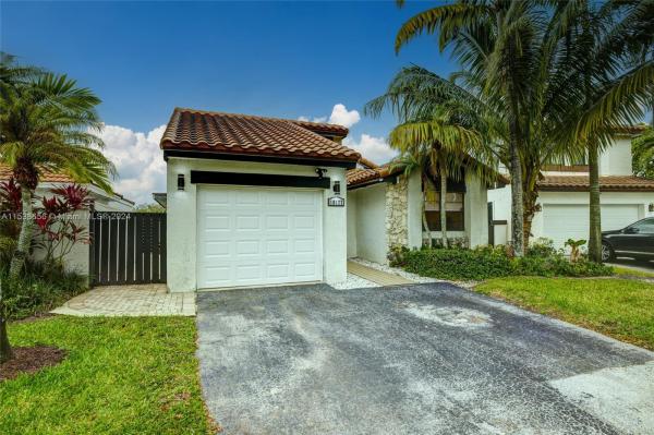 The Moors Cluster Homes, 18177 NW 62nd Ct, Country Club, Florida 33015, image 3