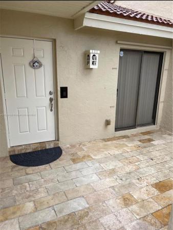 Villa Homes At The Moors, 6445 NW 171st St #6445, Country Club, Florida 33015, image 2
