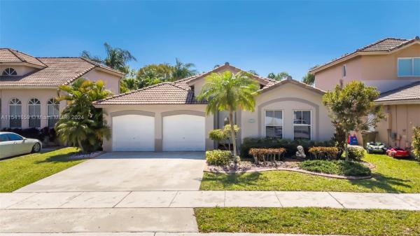 Poinciana Parc, 13744 S Garden Cove Cir, Davie, Florida 33325, image 1