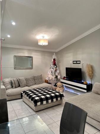Villa Homes At The Moors, 6044 NW 172nd Terr Cir #1, Country Club, Florida 33015, image 2