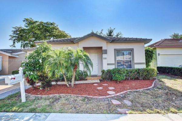 Caribe Isle At River Bridge, 145 Caribe Ct, Greenacres, Florida 33413, image 1