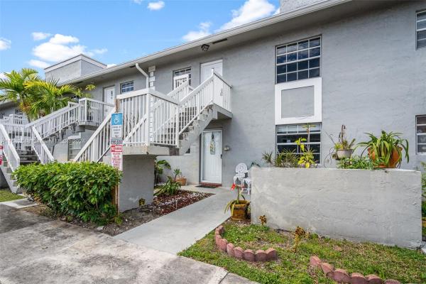 Monterey Village, 438 NE 210th Cir Ter #104-4B, Ives Estates, Florida 33179, image 1