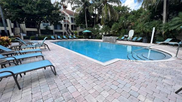 Poinciana Place, 5860 W Sample Rd #207, Coral Springs, Florida 33067, image 1